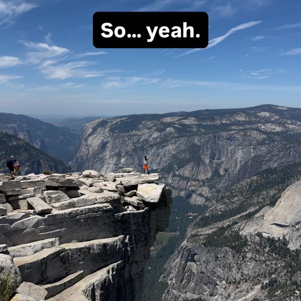 A rocky overlook above a mountain valley